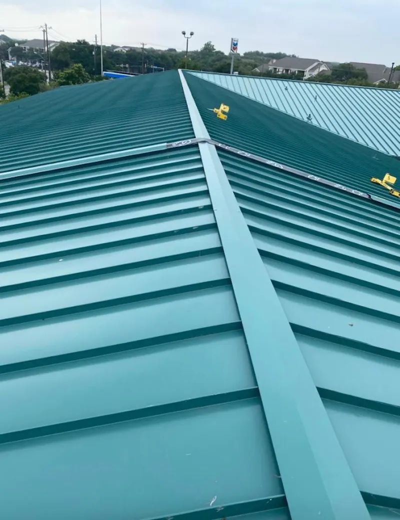 Green commercial metal roof ridge and valley for Metal Roof Repair in West Earl