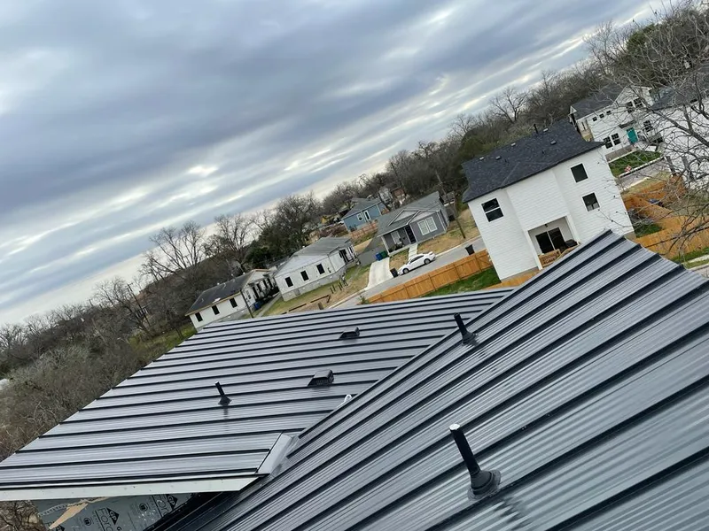 Standing seam metal roof panels with vents for Skylight Repair in West Earl